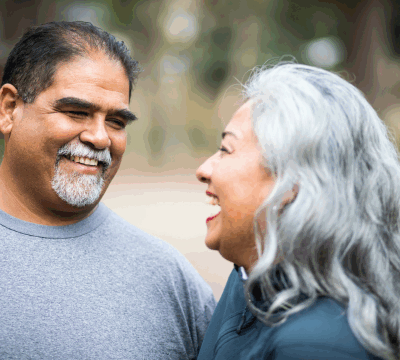 Older couple smiling at eachother