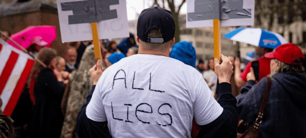 A man at a right-wing protest against COVID policies in Albany, New York.