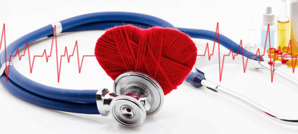 Stethoscope and red heart on a white background.